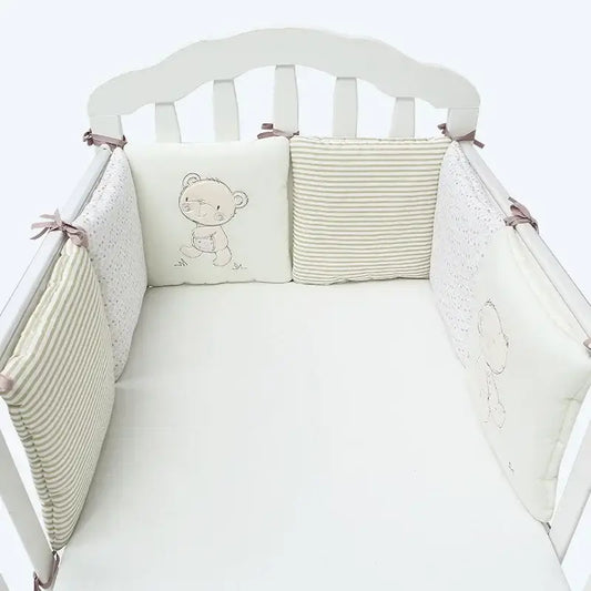 Coussin pour tour de lit bébé